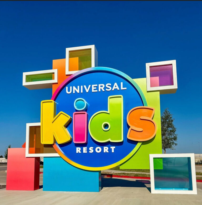 Colorful entrance rendering of Universal Kids Resort in Frisco, Texas, featuring family attractions inspired by Shrek, SpongeBob SquarePants, Minions, Jurassic World, Trolls, and Gabby's Dollhouse.